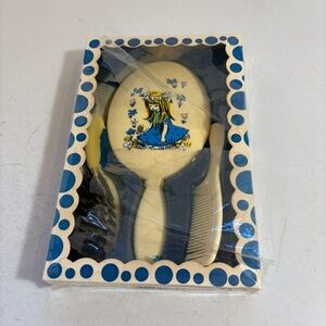 Vintage NIB plastic hairbrush, comb, and mirror plastic set